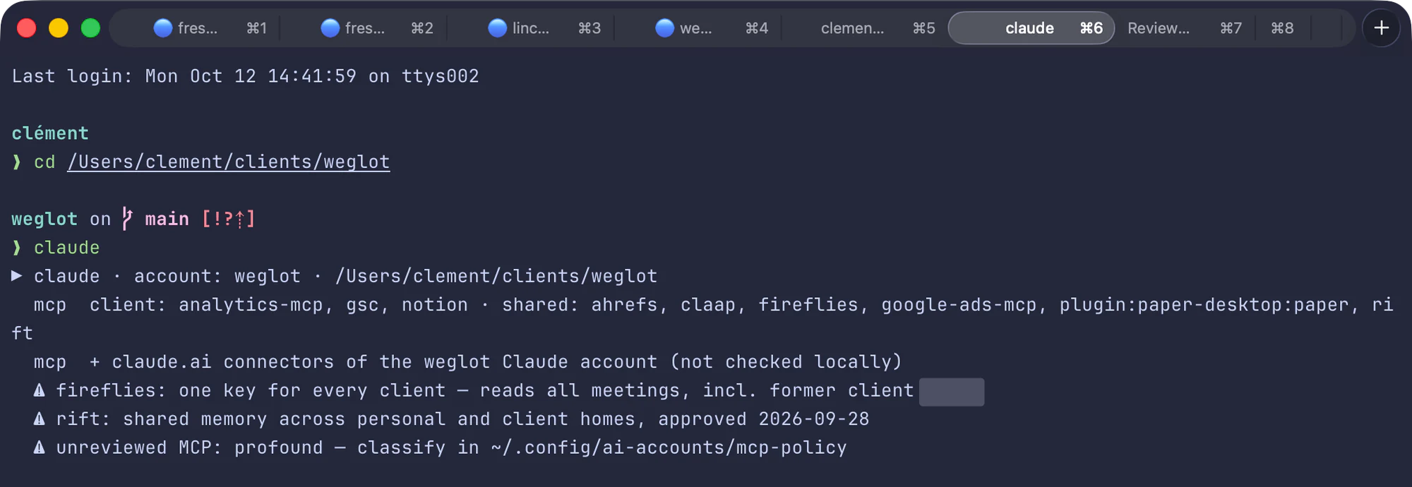 A terminal. I go into a client's folder and type claude. The script prints: claude, the name of that client's account, the folder. Then the connectors it found for that account: 3 that belong to the client, and 6 shared ones. Then 3 warnings: one key reads the meetings of every client, the memory is shared across personal and client accounts, and one connector has not been reviewed yet.